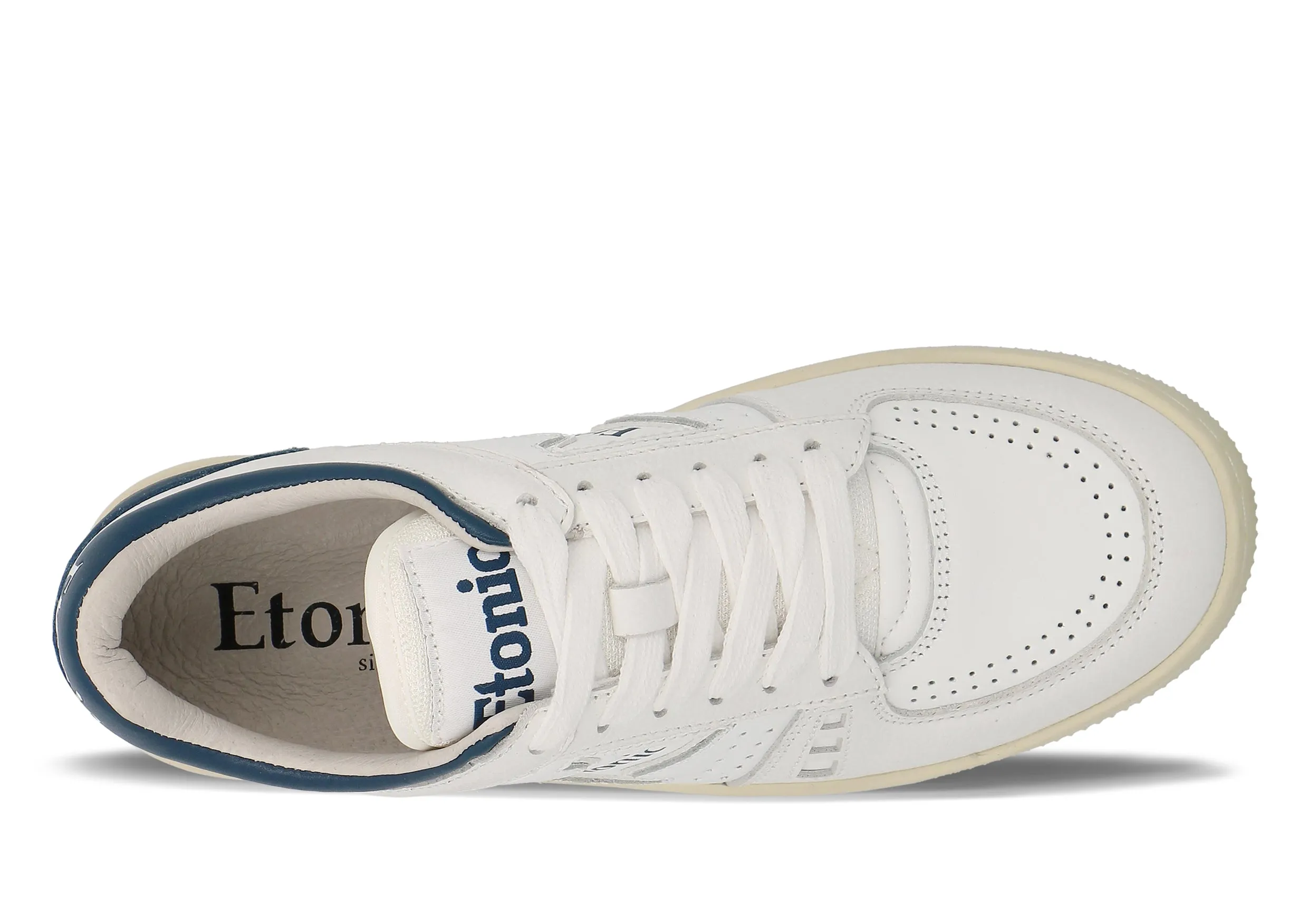 Etonic B509 sneakers in white leather with dark blue details and beige outsole.